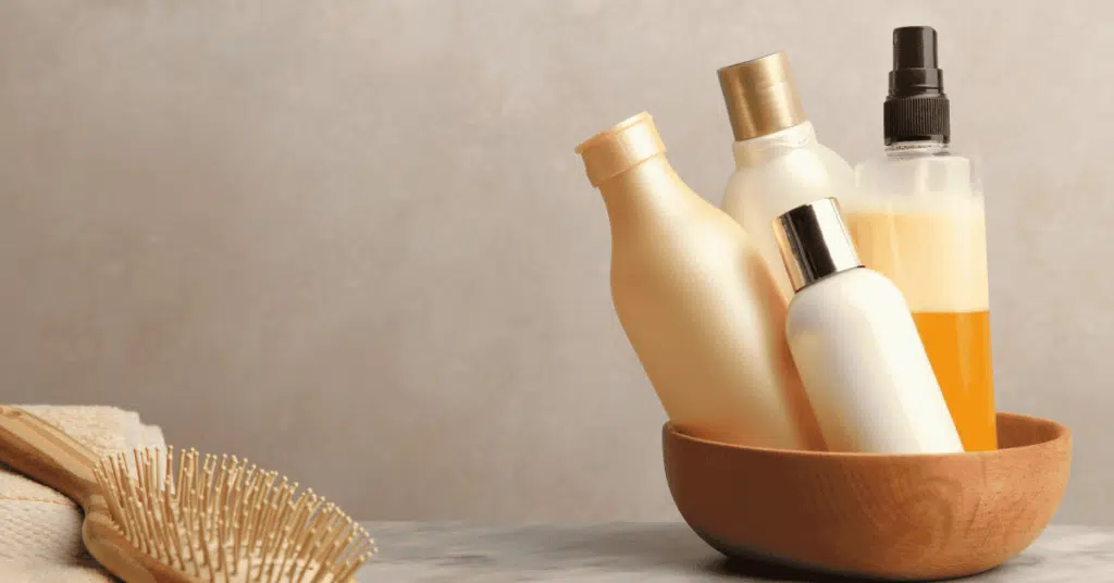 Minimal hair care flat lay representing a simple wash schedule for wavy hair